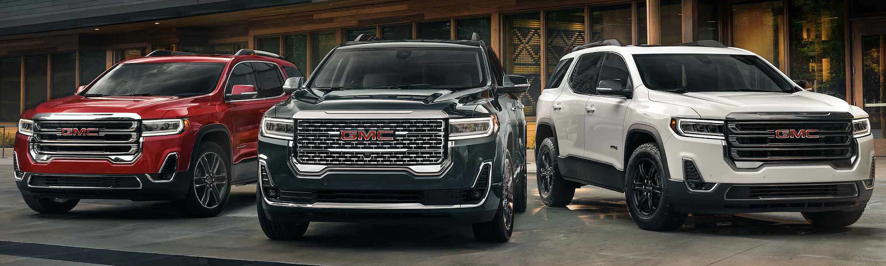 Three models of the 2023 GMC Acadia.