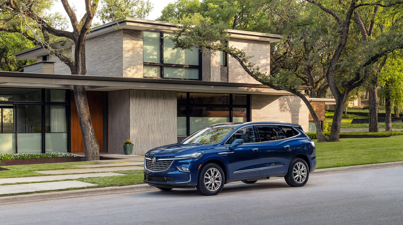 Buick Enclave in front of house