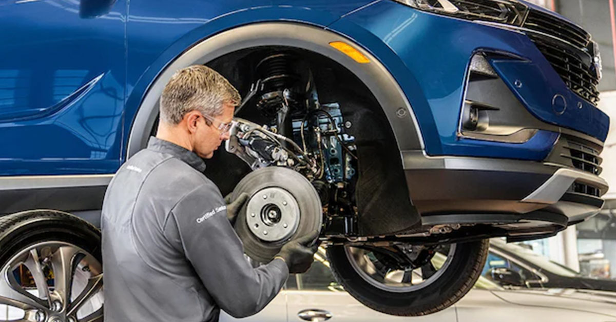 Mechanic performing Buick brake repair