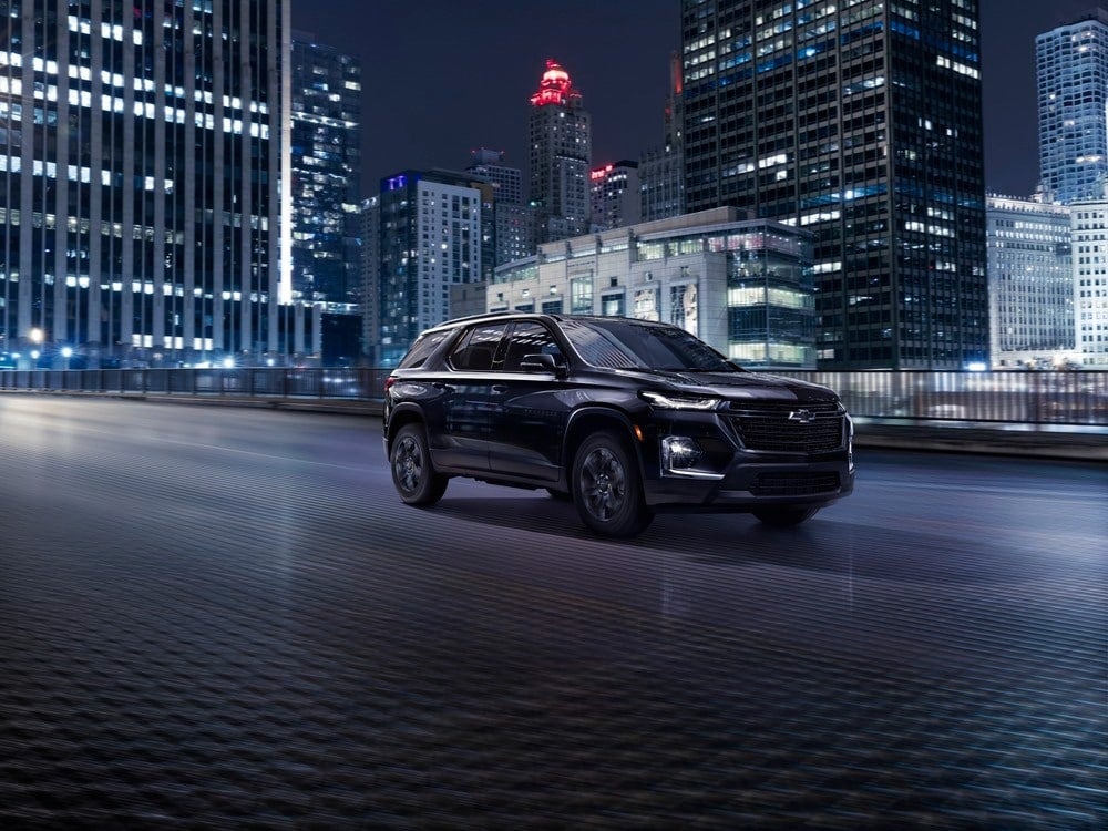 Black 2022 Chevy Traverse at night